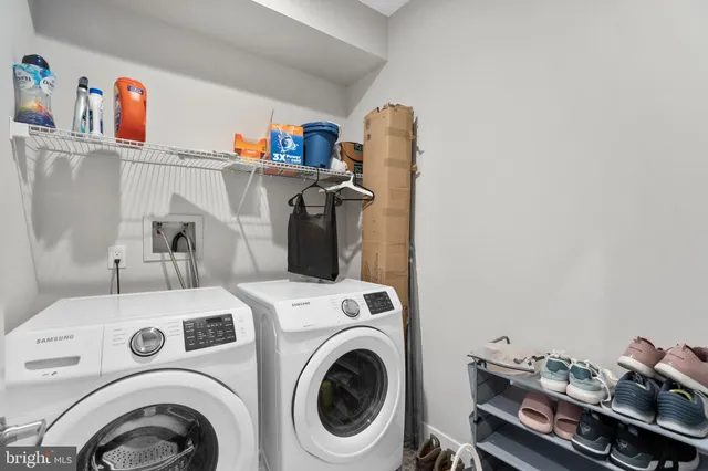 a utility room with dryer and washer