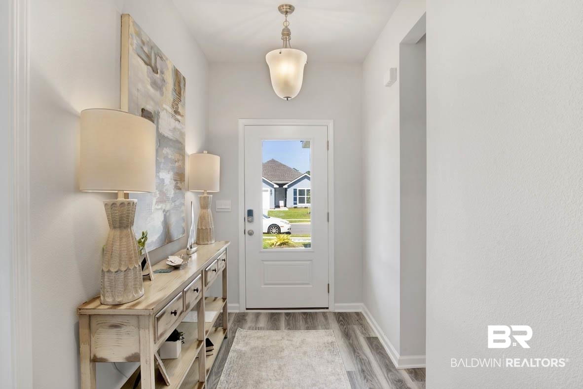 13822 Antler Hl Road Daphne, AL 36527 - Photo 22 of 39 Doorway to outside with light wood-type flooring