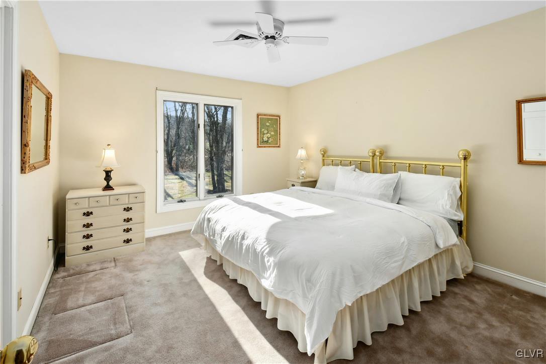 2154 Spring Valley Road Bethlehem, PA 18015 - Photo 33 of 50 a large bedroom with bed and wooden floor