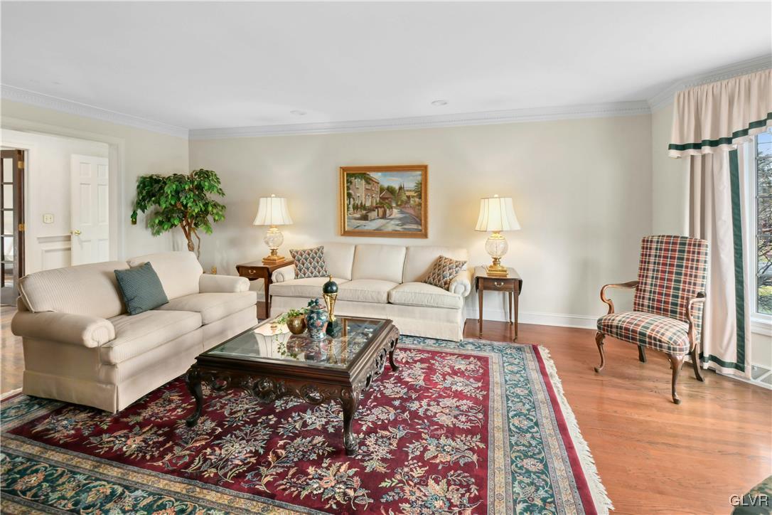 2154 Spring Valley Road Bethlehem, PA 18015 - Photo 8 of 50 a living room with furniture and a rug