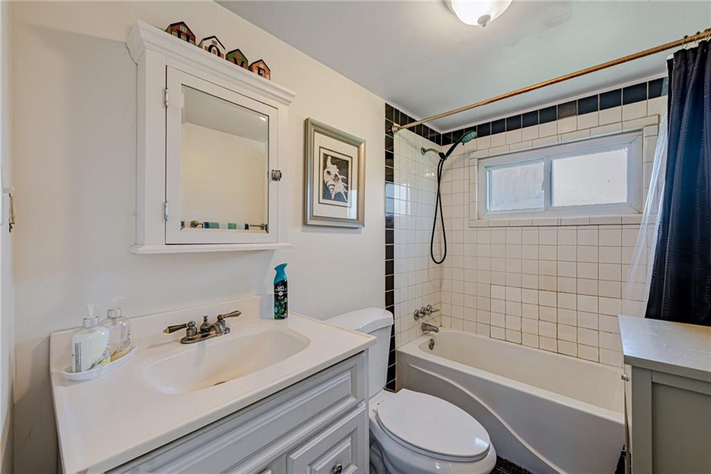 184 Glen Eden Road Rochester, PA 15074 - Photo 14 of 25 a bathroom with a sink toilet and shower