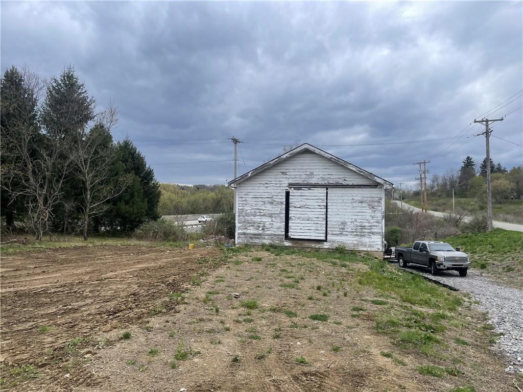184 Glen Eden Road Rochester, PA 15074 - Photo 20 of 25 a view of a house with a yard and garage