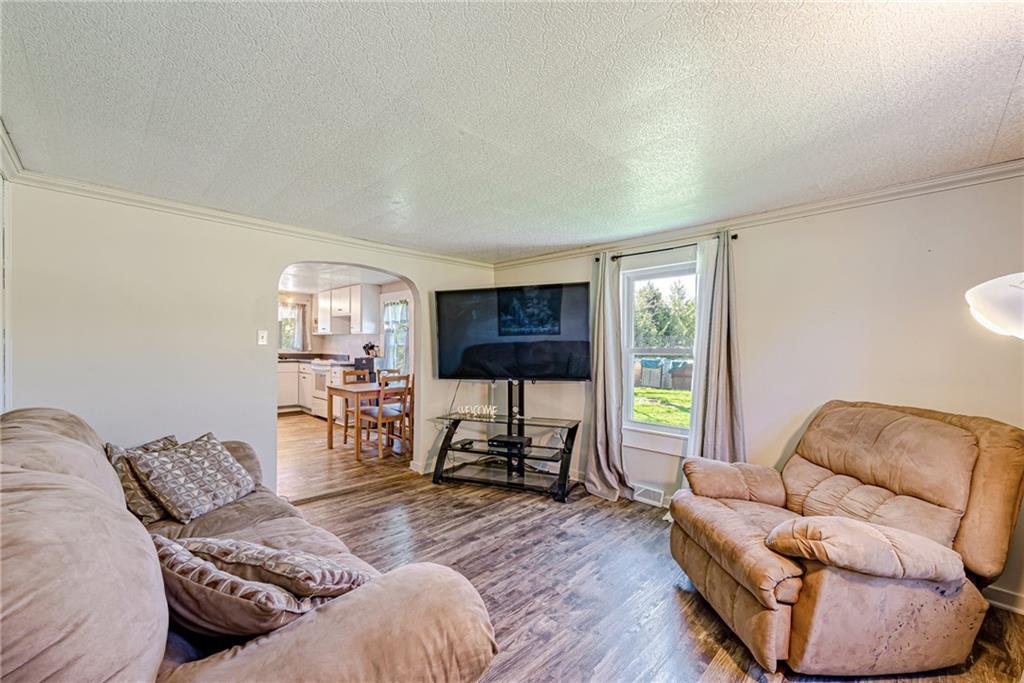 184 Glen Eden Road Rochester, PA 15074 - Photo 4 of 25 a living room with furniture and a wooden floor