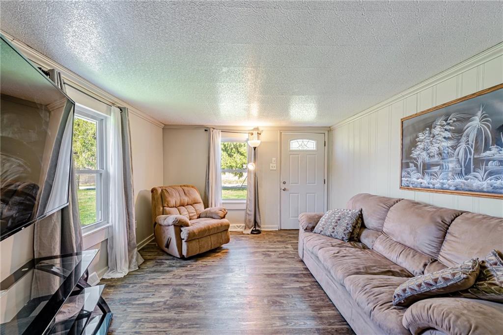 184 Glen Eden Road Rochester, PA 15074 - Photo 5 of 25 a living room with furniture and a couch