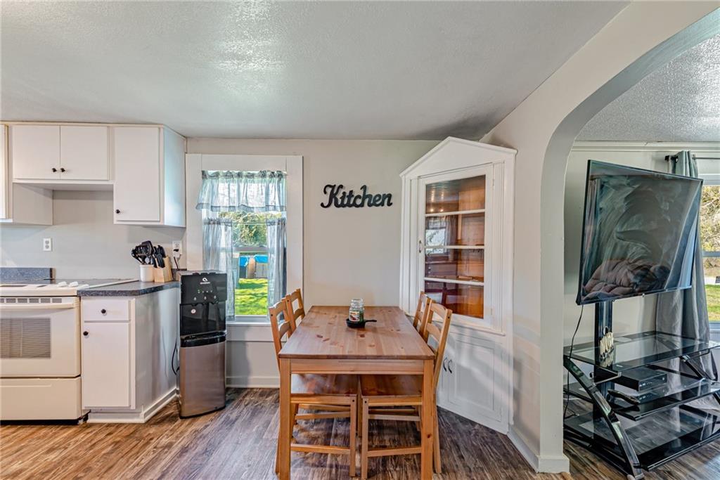184 Glen Eden Road Rochester, PA 15074 - Photo 6 of 25 a view of a kitchen with workspace and wooden floor