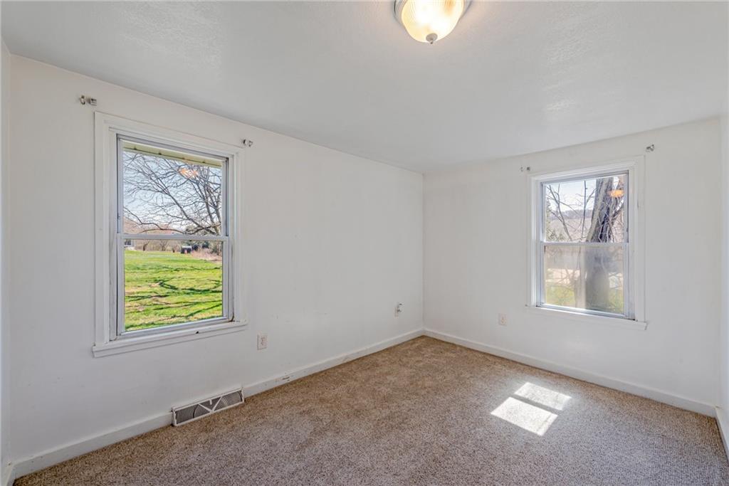 184 Glen Eden Road Rochester, PA 15074 - Photo 10 of 25 a view of an empty room with a window