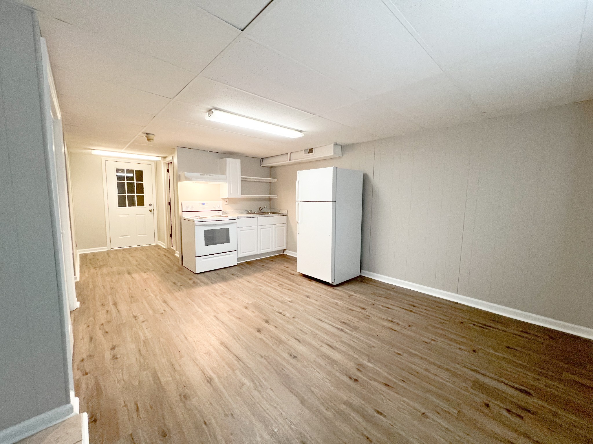 175 Condor Court Clarksville, TN 37042 - Photo 2 of 14 a view of a kitchen with a sink and a refrigerator