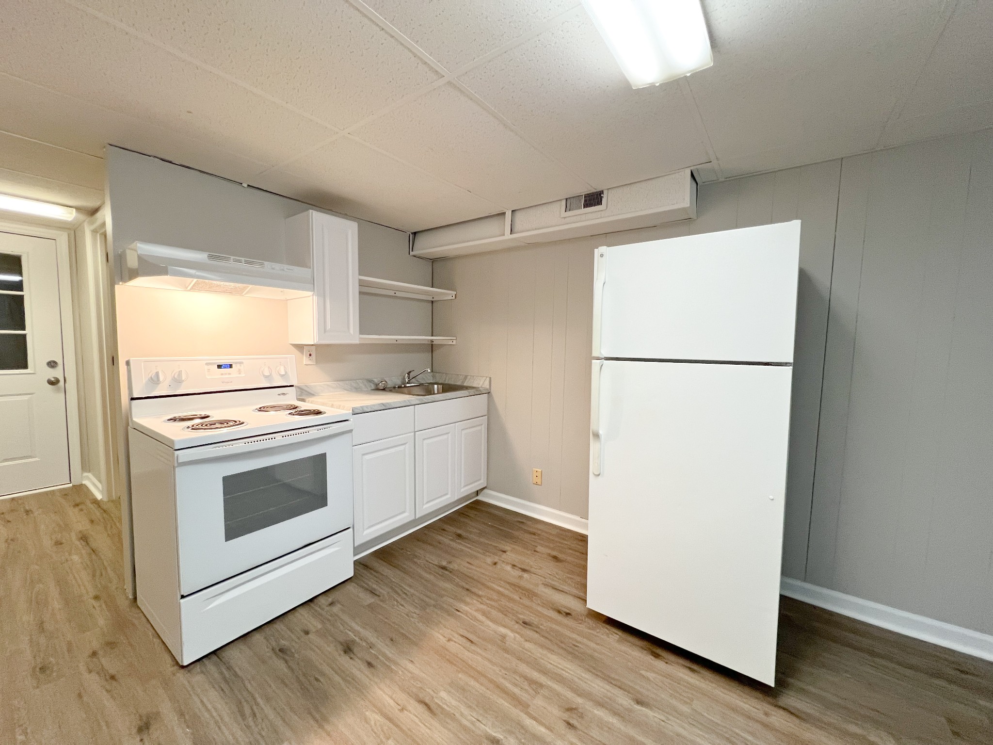 175 Condor Court Clarksville, TN 37042 - Photo 5 of 14 a white refrigerator freezer sitting inside of a kitchen