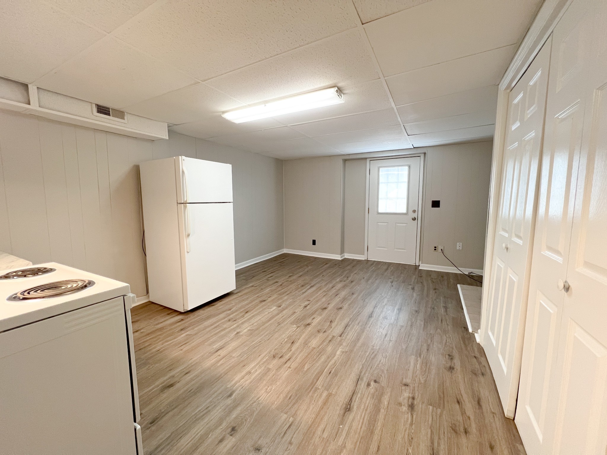 175 Condor Court Clarksville, TN 37042 - Photo 6 of 14 a view of a room with wooden floor and white doors