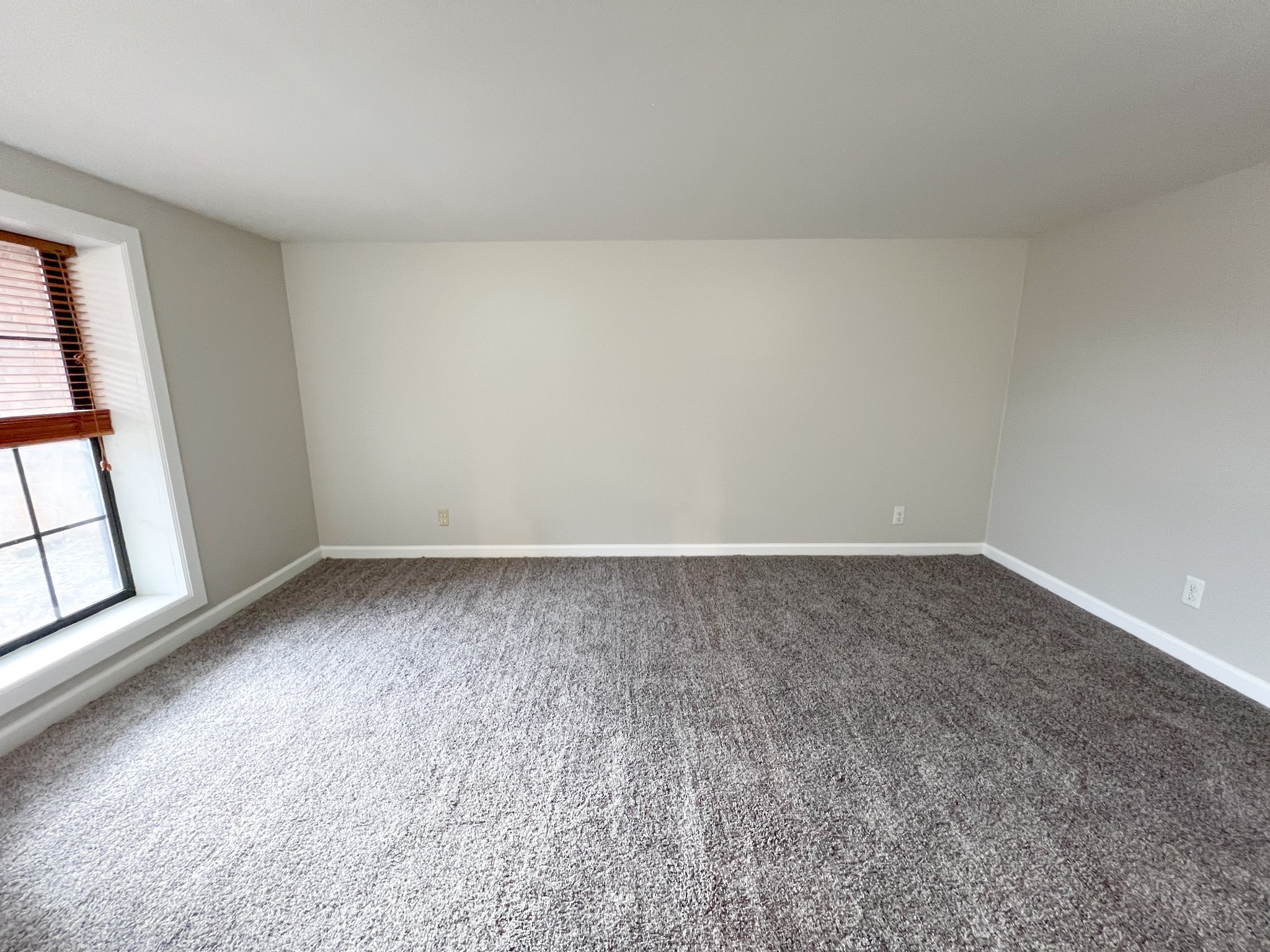 175 Condor Court Clarksville, TN 37042 - Photo 10 of 14 wooden floor in an empty room with a window
