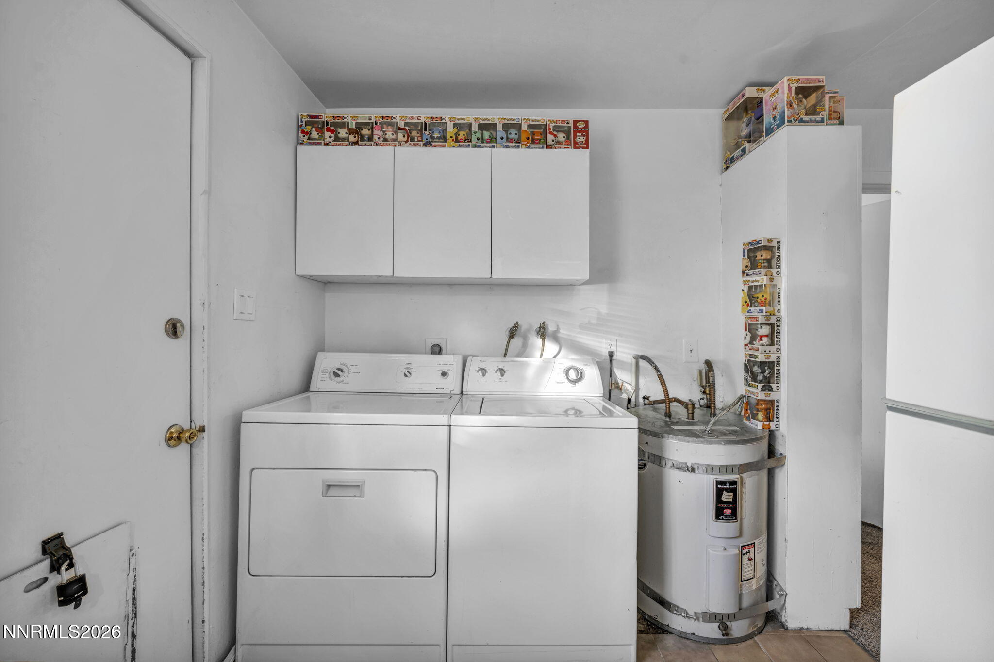 11932 Rocky Mountain Street Reno, NV 89506 - Photo 11 of 26 a utility room with dryer and washer