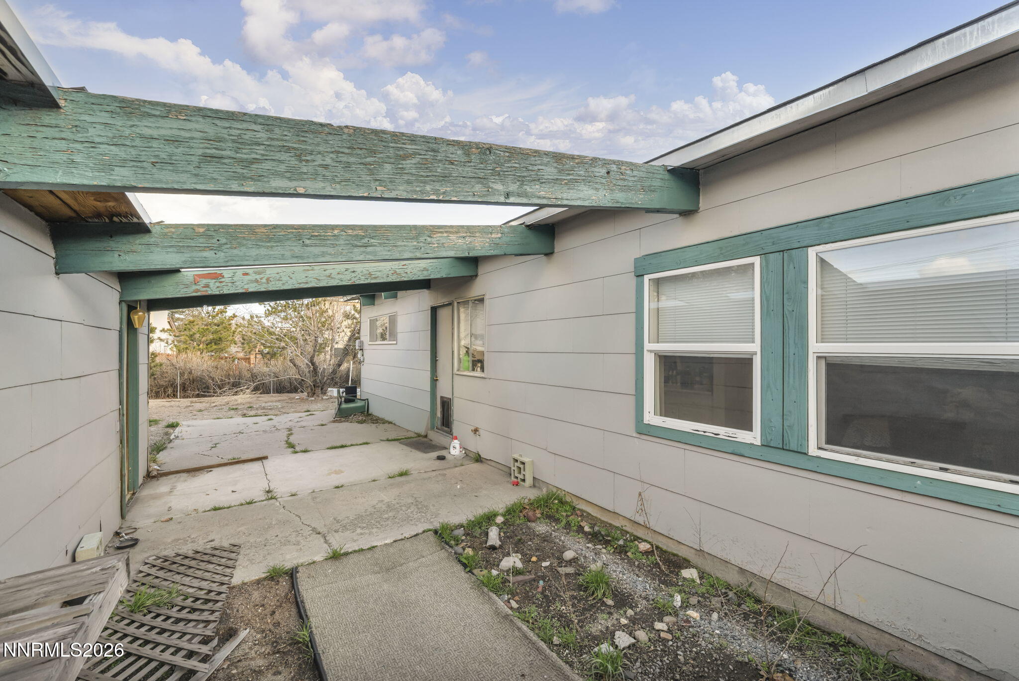 11932 Rocky Mountain Street Reno, NV 89506 - Photo 20 of 26 a view of a porch