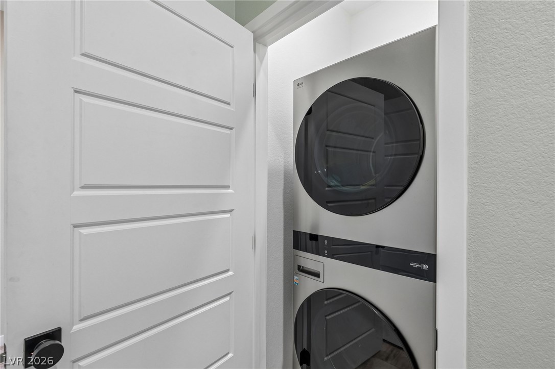 194 Viento Ridge Street Henderson, NV 89012 - Photo 25 of 72 A dedicated laundry closet optimizes space with efficient stacked appliances.