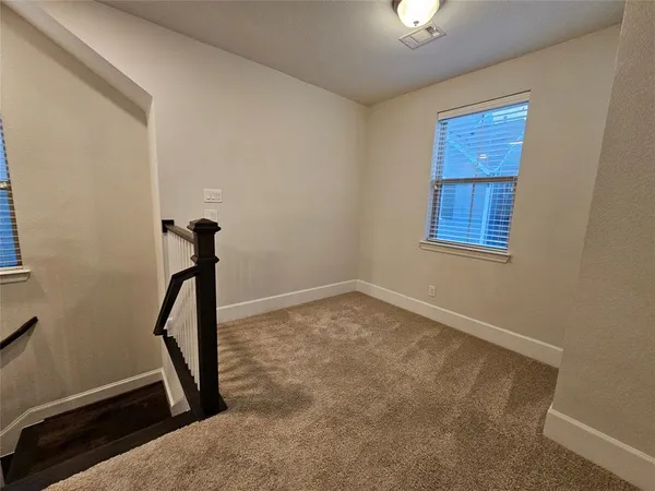 a view of a room with windows