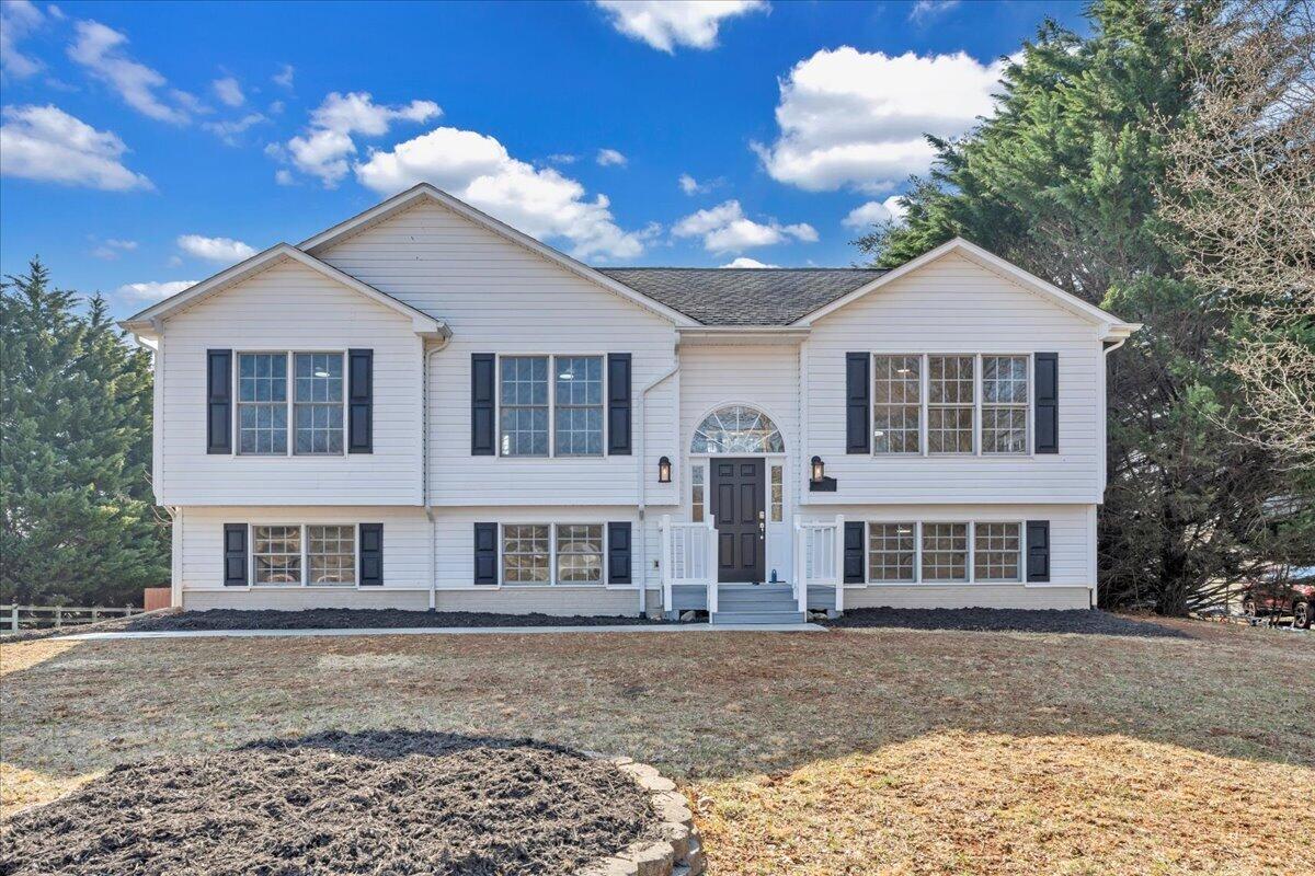 1510 Navigation Point Goodview, VA 24095 - Photo 1 of 48 a front view of a house with a yard