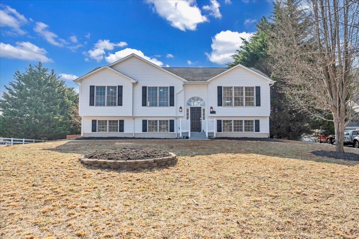 1510 Navigation Point Goodview, VA 24095 - Photo 2 of 48 a front view of a house with a yard
