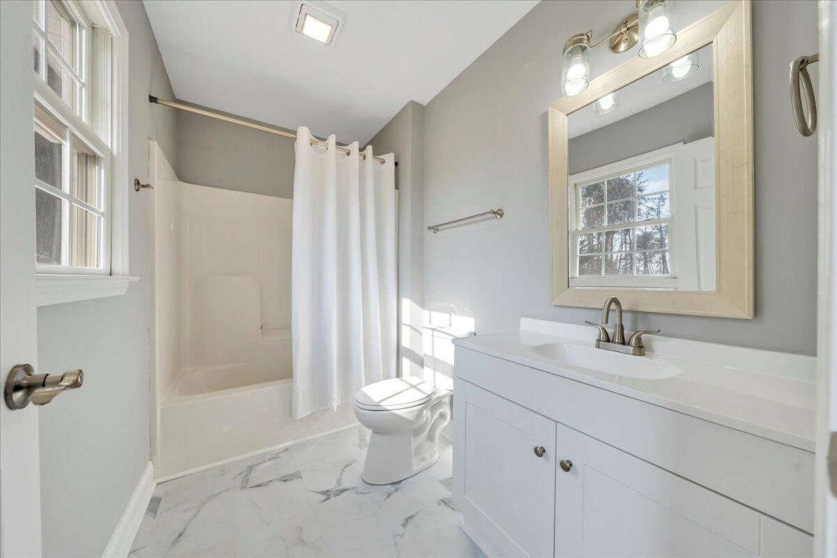 1510 Navigation Point Goodview, VA 24095 - Photo 27 of 48 a bathroom with a sink toilet and shower