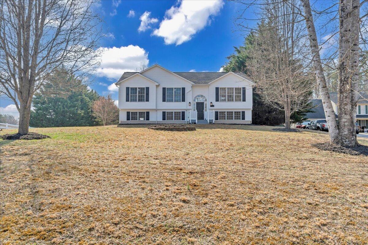 1510 Navigation Point Goodview, VA 24095 - Photo 3 of 48 a front view of a house with a yard