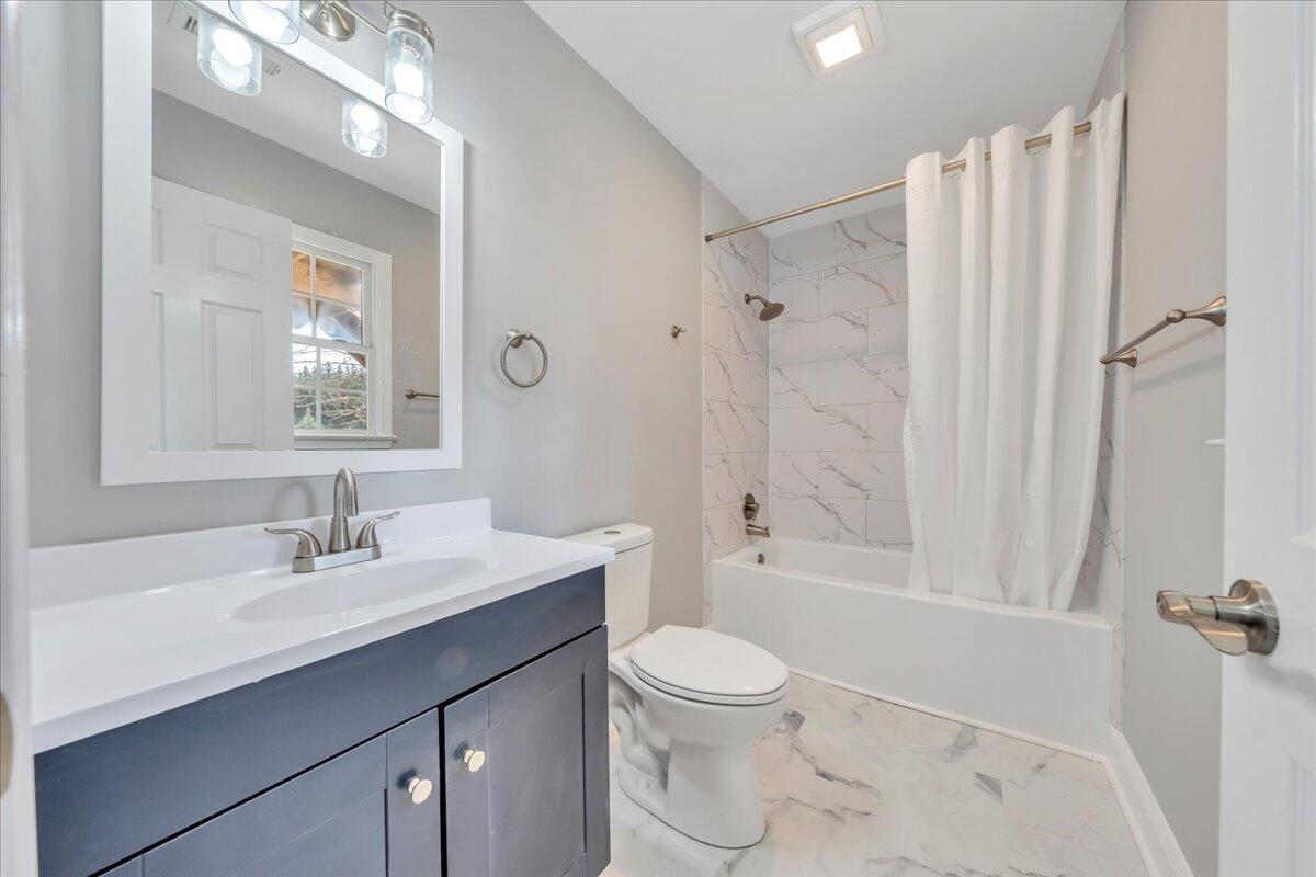 1510 Navigation Point Goodview, VA 24095 - Photo 33 of 48 a bathroom with a sink toilet and shower