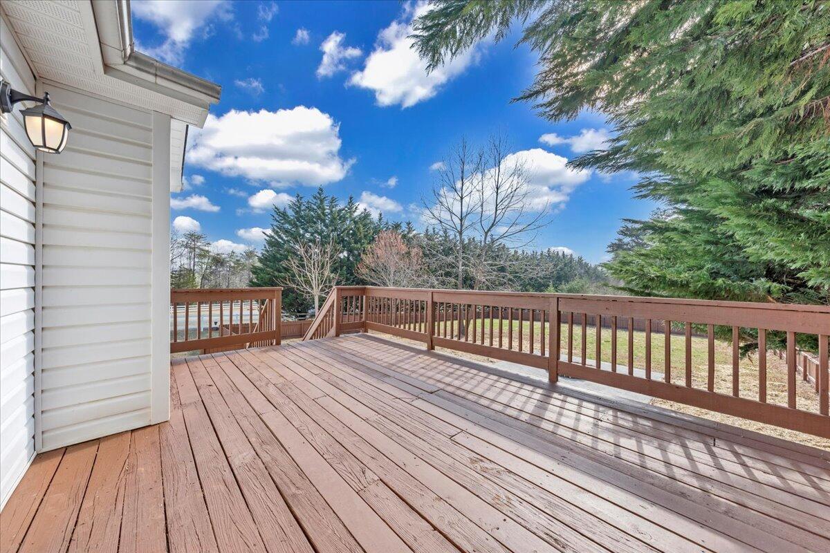 1510 Navigation Point Goodview, VA 24095 - Photo 37 of 48 a balcony with wooden floor and fence
