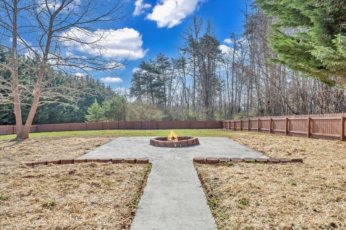 1510 Navigation Point Goodview, VA 24095 - Photo 41 of 48 a view of a yard with wooden fence