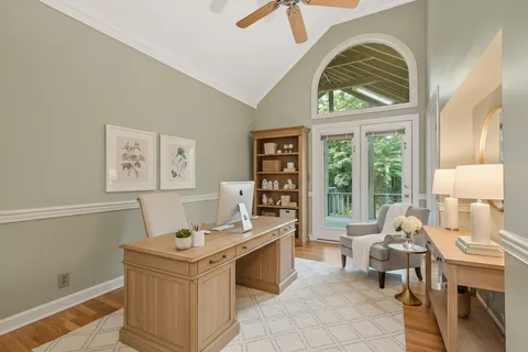 a room with furniture and a large window