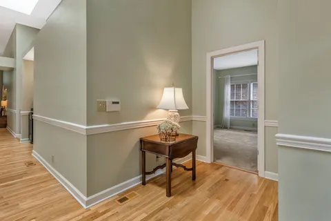 a view of a livingroom with furniture and wooden floor