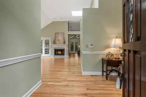 a view of a livingroom with furniture and a fireplace
