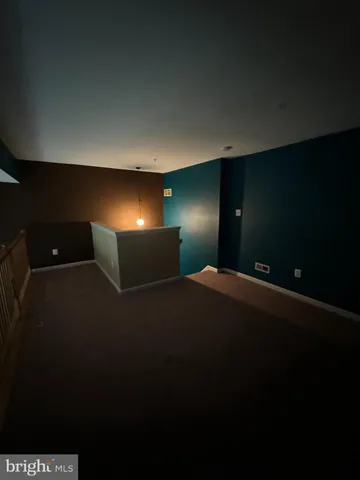 a night stand sitting in middle of a room