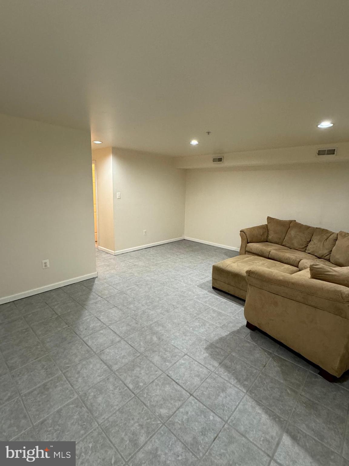 2109 Taylor Court Abingdon, MD 21009 - Photo 20 of 27 a living room with furniture and a rug