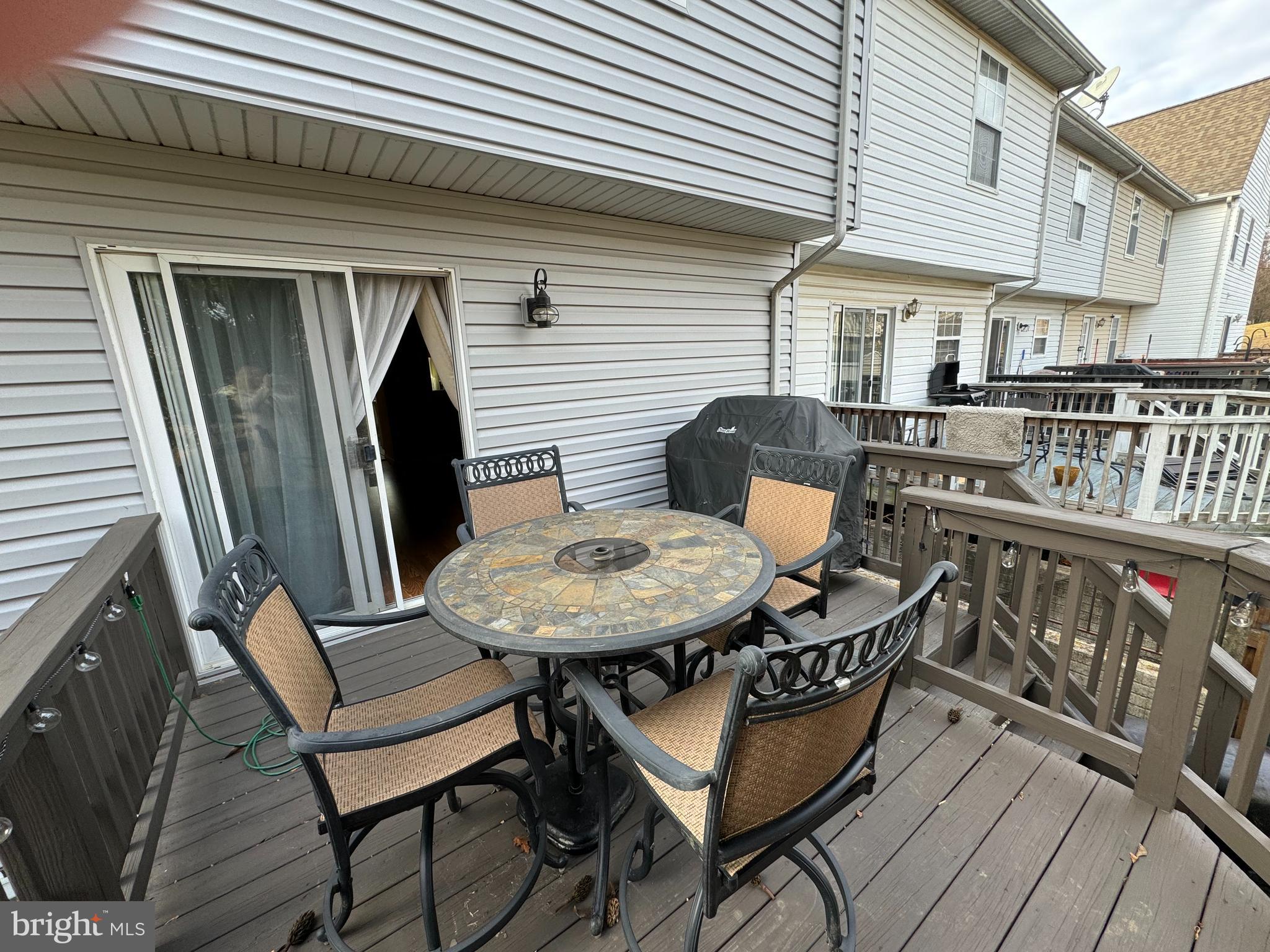 2109 Taylor Court Abingdon, MD 21009 - Photo 25 of 27 a balcony with table and chairs