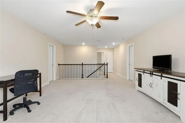 a view of an outdoor space and tennis court