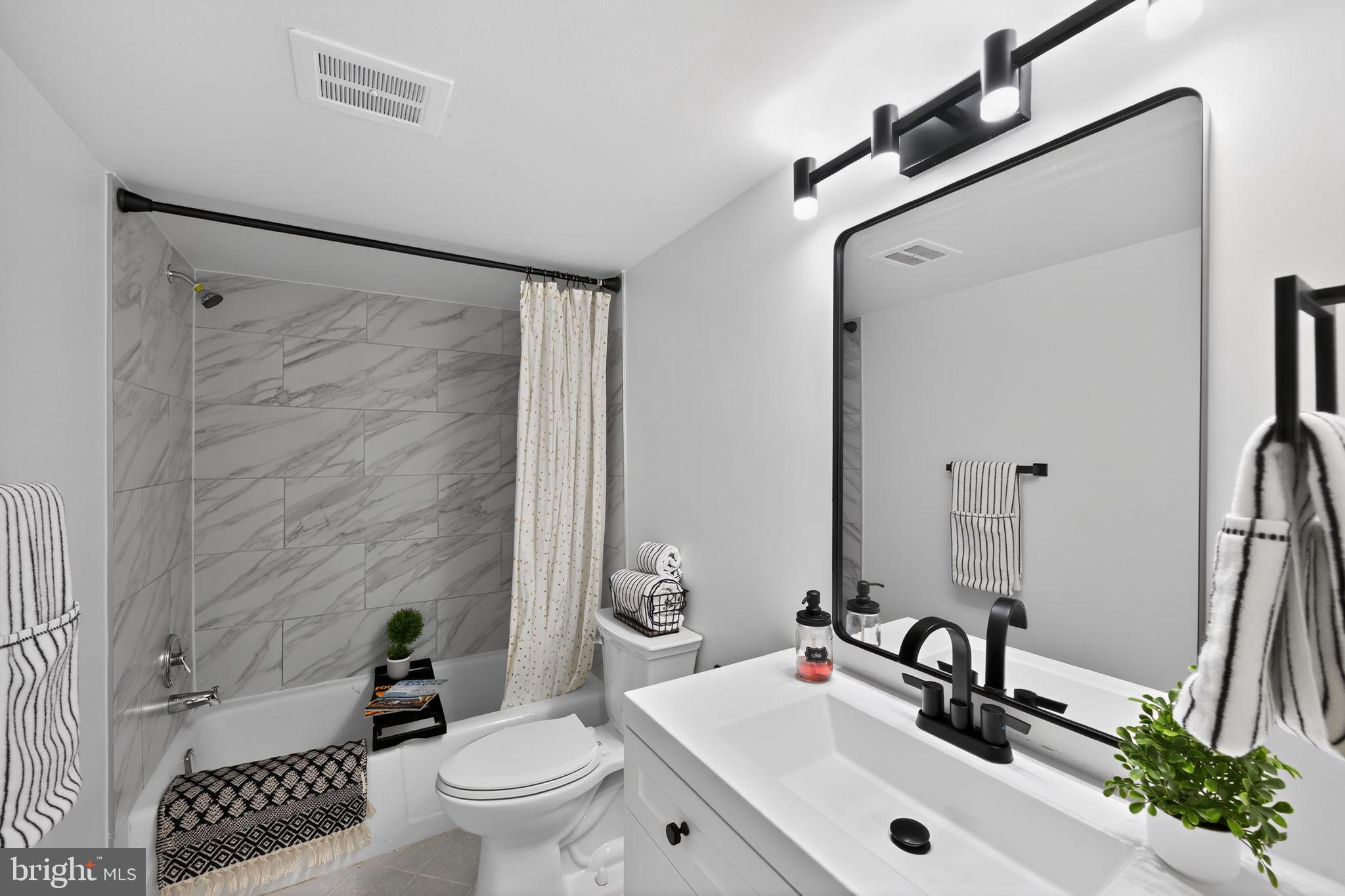 1533 Northgate Square, Unit 11B Reston, VA 20190 - Photo 9 of 13 Renovated bathroom