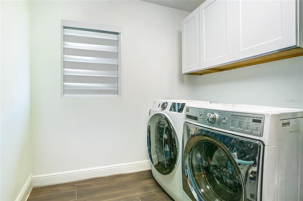 960 Strathmore Drive Orlando, FL 32806 - Photo 18 of 25 a utility room with dryer and washer