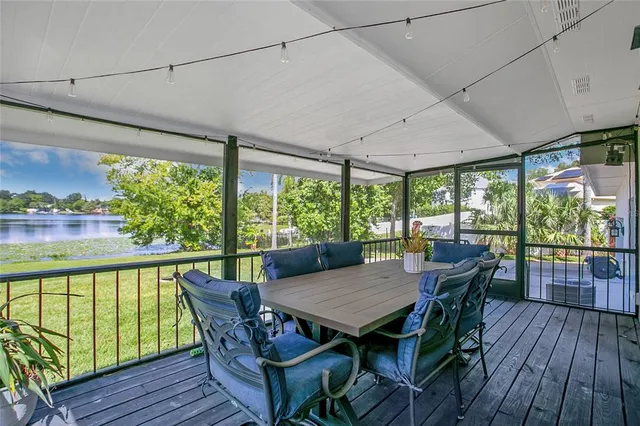 a view of a patio with a table chairs and a table