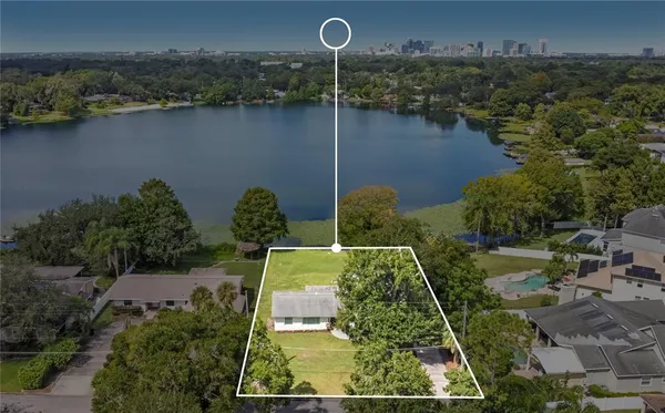 an aerial view of a house having yard
