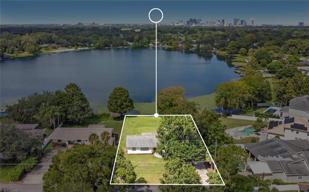 960 Strathmore Drive Orlando, FL 32806 - Photo 24 of 25 an aerial view of a house having yard