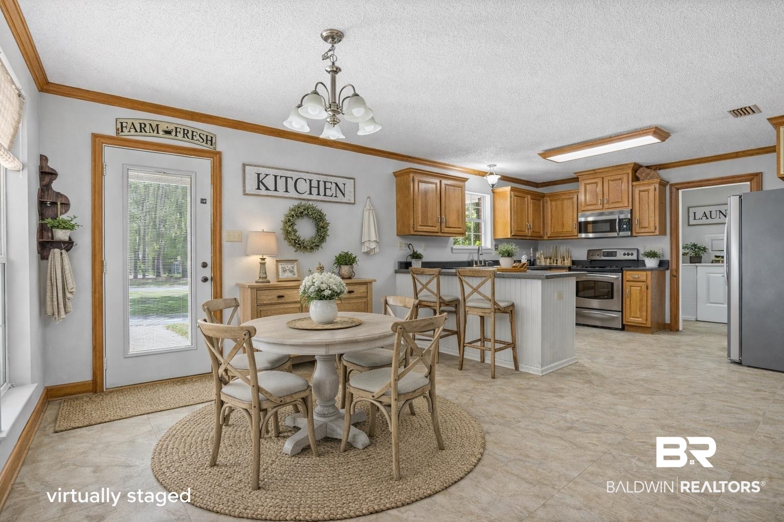10140 Lakeview Road Bay Minette, AL 36507 - Photo 8 of 35 kitchen with crown molding, a chandelier for eat in kitchen