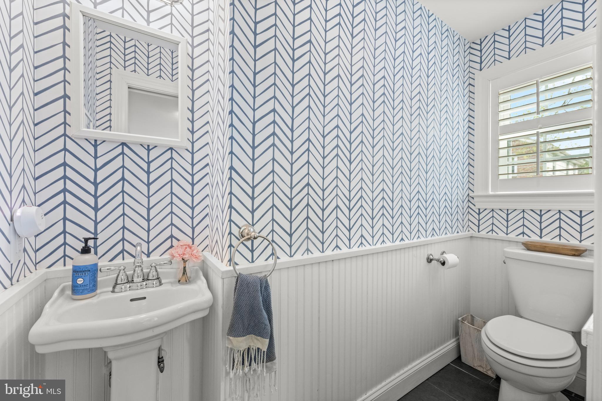 251 Rosedale Avenue Wayne, PA 19087 - Photo 24 of 53 a bathroom with a sink and mirror with toilet