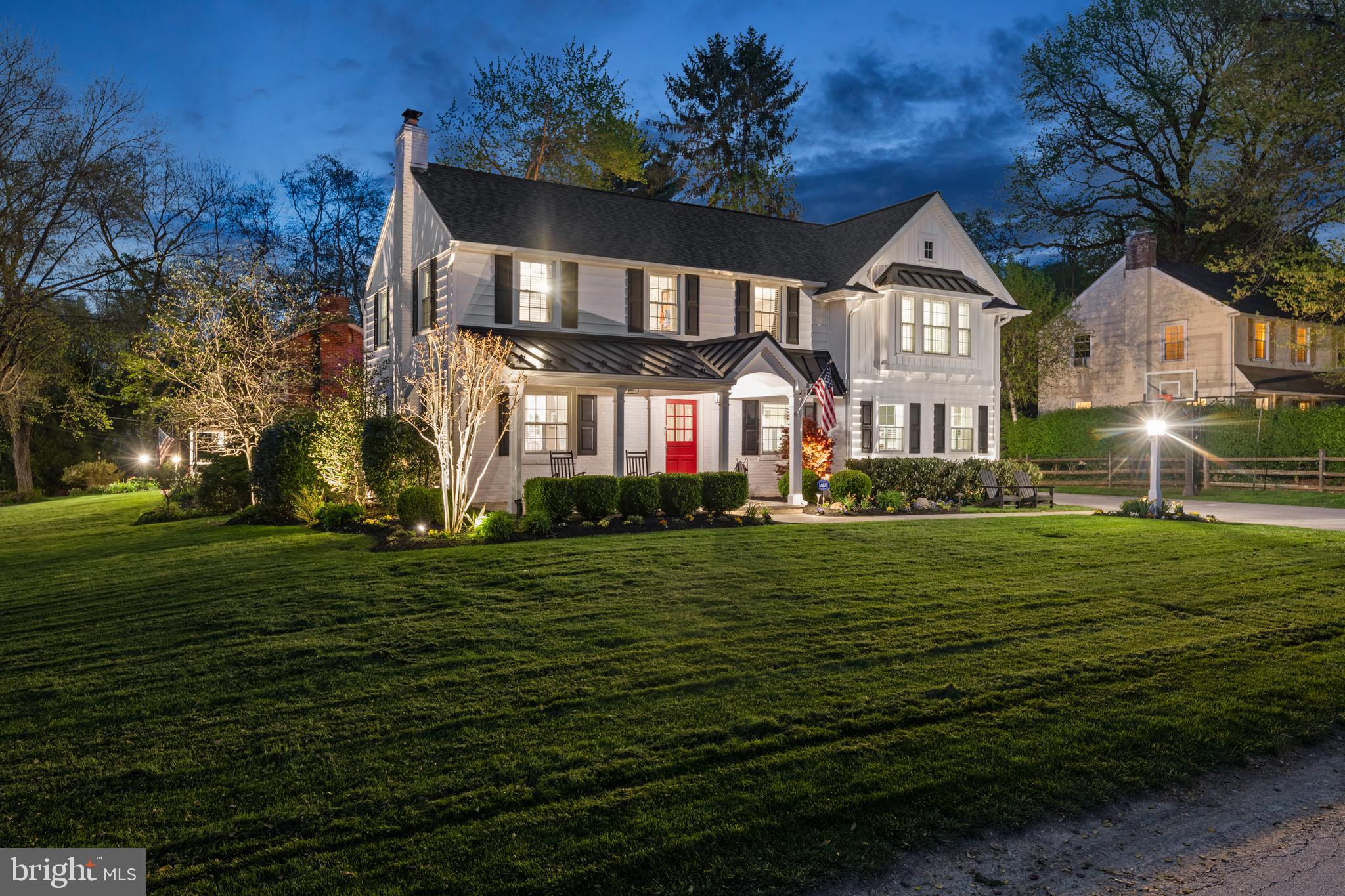 251 Rosedale Avenue Wayne, PA 19087 - Photo 4 of 53 a front view of a house with a garden