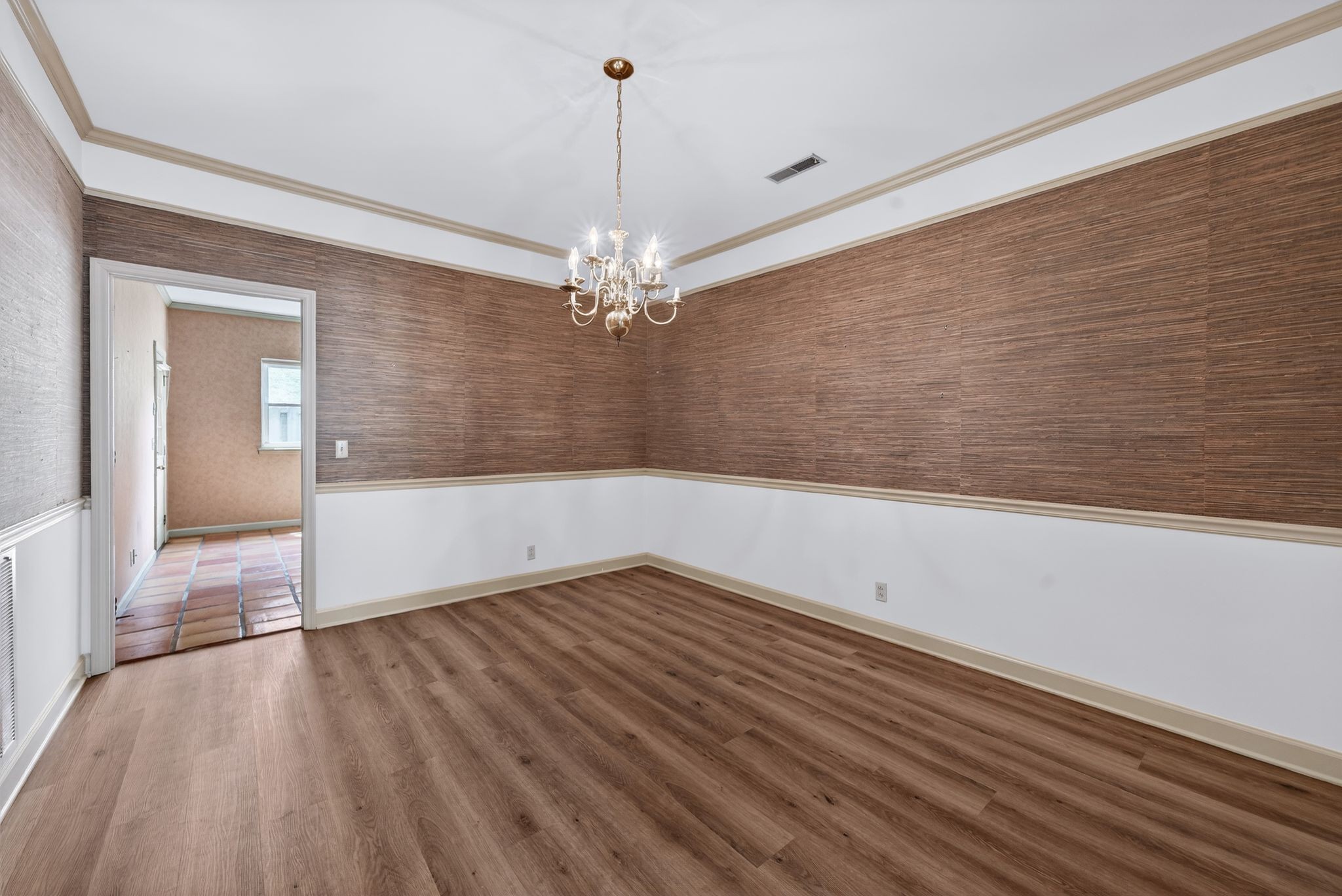 2041 Union Place Columbia, TN 38401 - Photo 6 of 24 a view of a room with wooden floor and chandelier