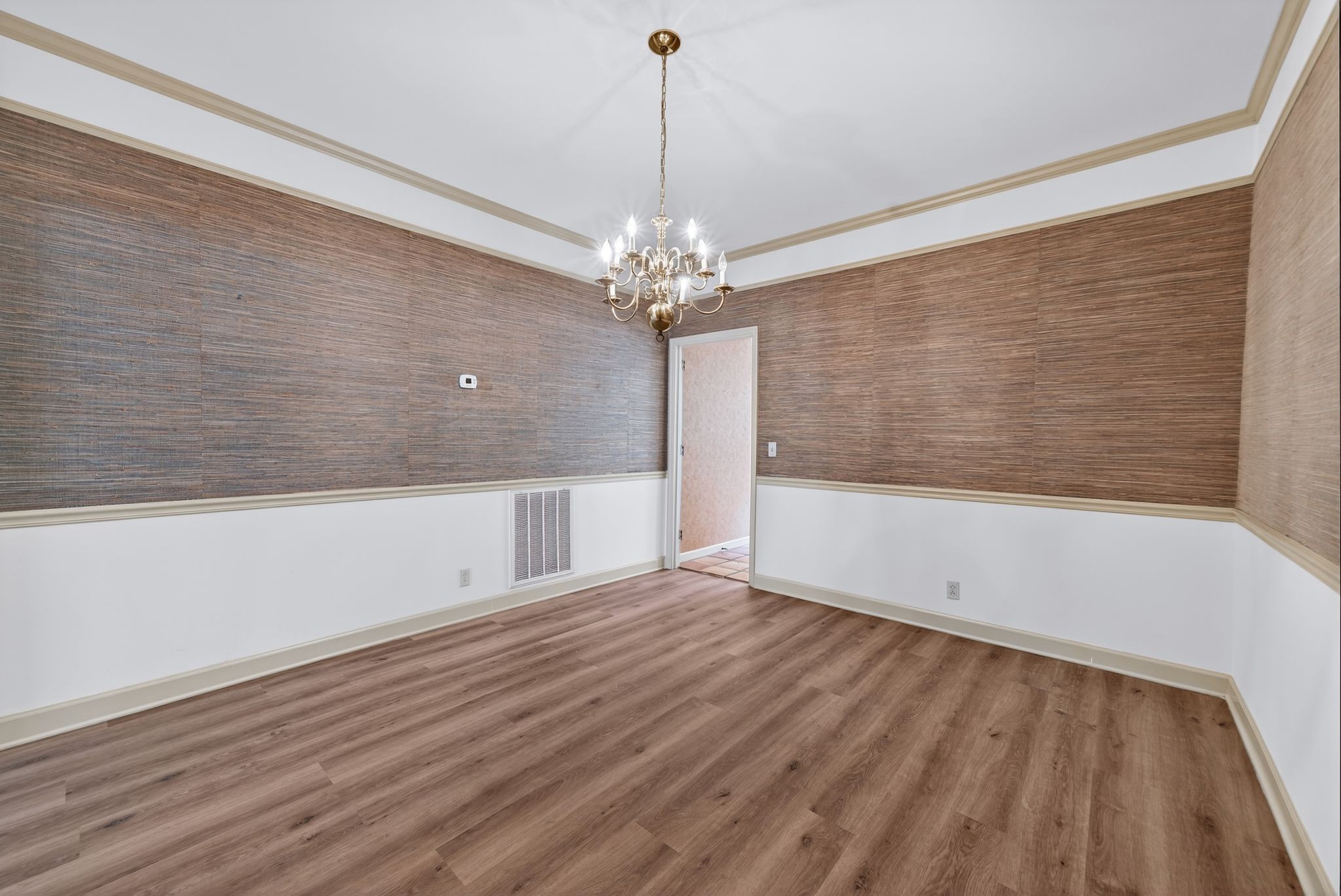 2041 Union Place Columbia, TN 38401 - Photo 7 of 24 a view of a room with wooden floor and chandelier