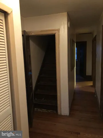 a view of entryway with wooden floor