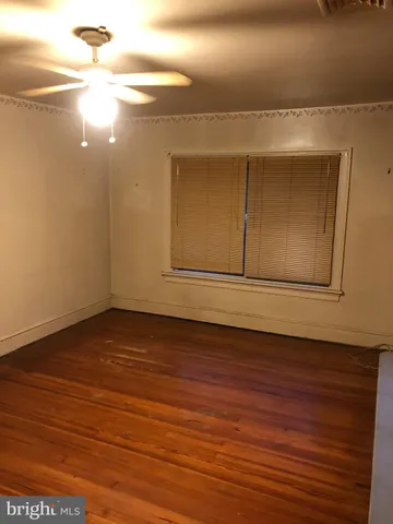 a bathroom with a bathtub a sink a toilet and a shower