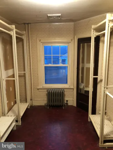 a kitchen with a sink and a window