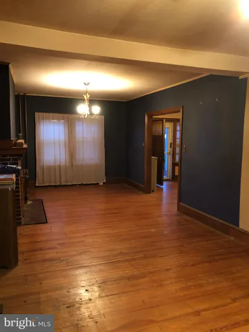 a bathroom with a bathtub and a window