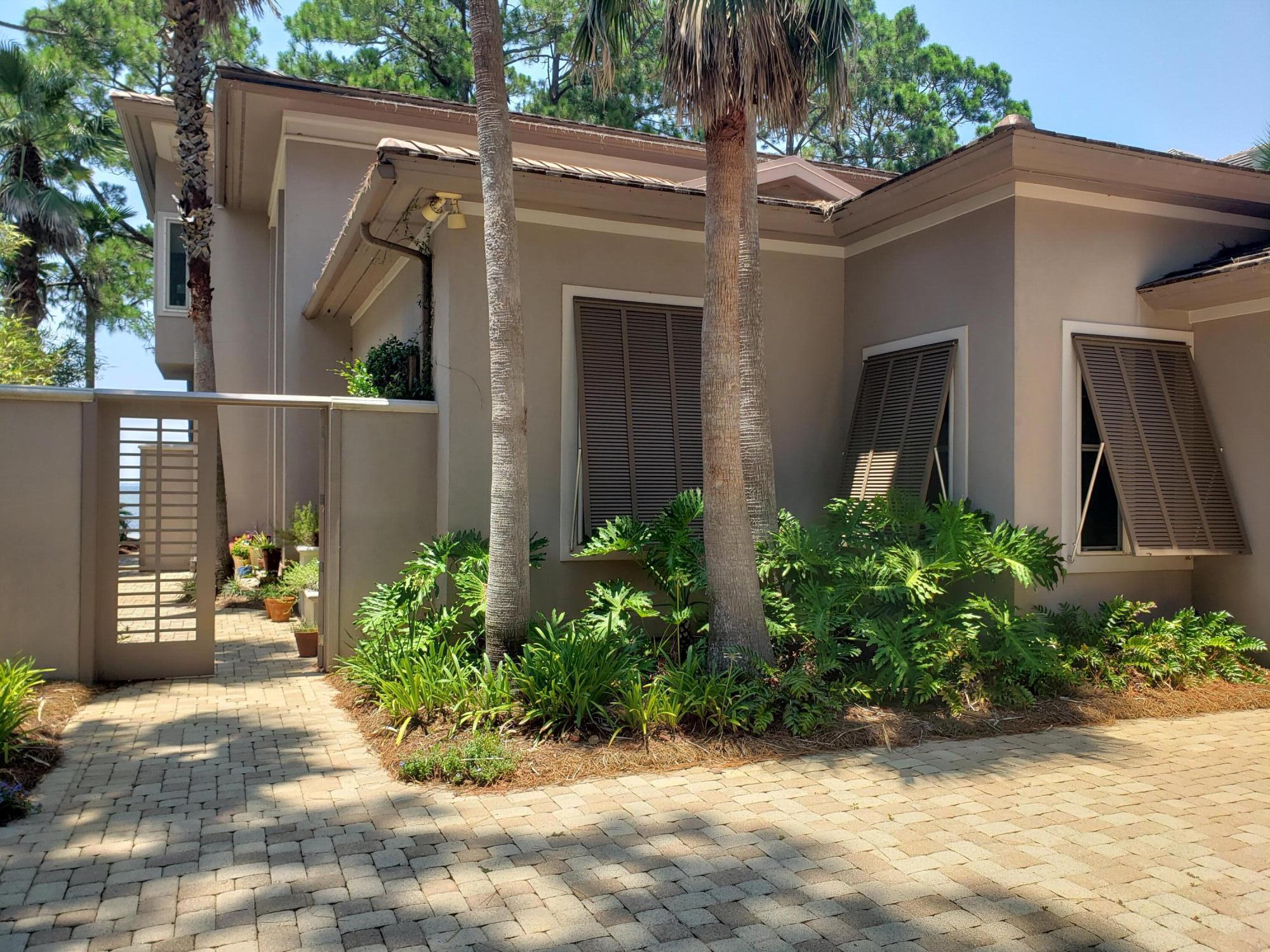 3003 Bay Villas Drive Miramar Beach, FL 32550 - Photo 2 of 2 a view of a back yard of the house