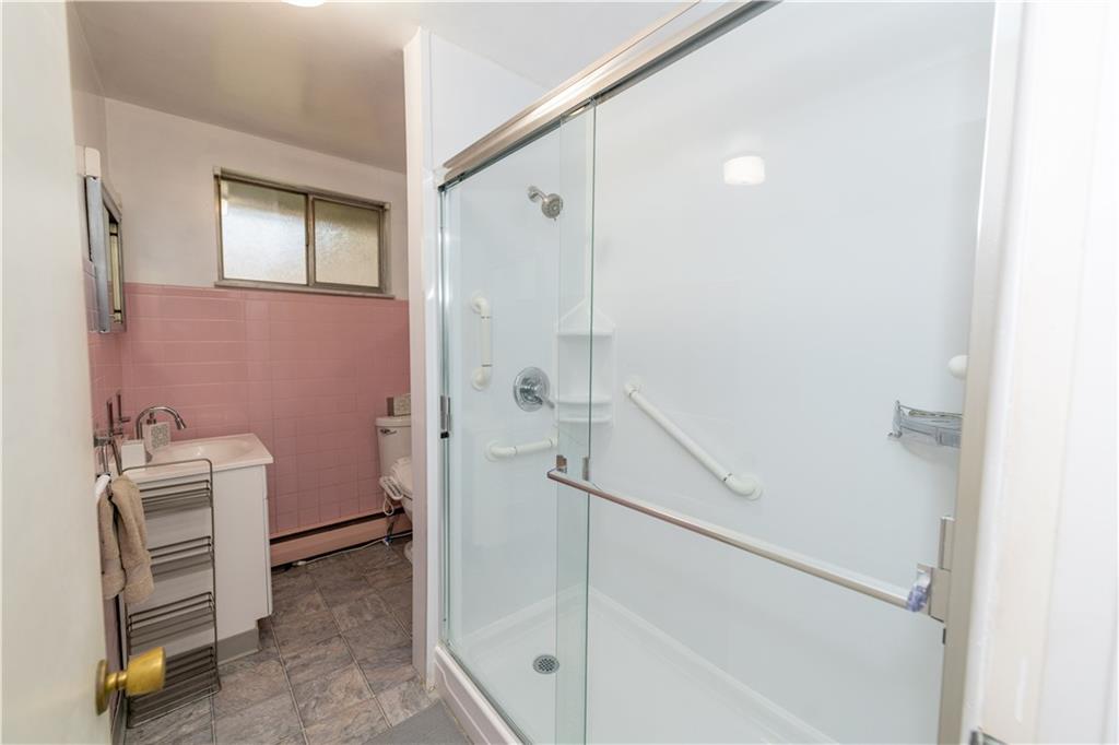 1041 Anderson Road Pittsburgh, PA 15209 - Photo 28 of 41 a bathroom with a shower and a sink