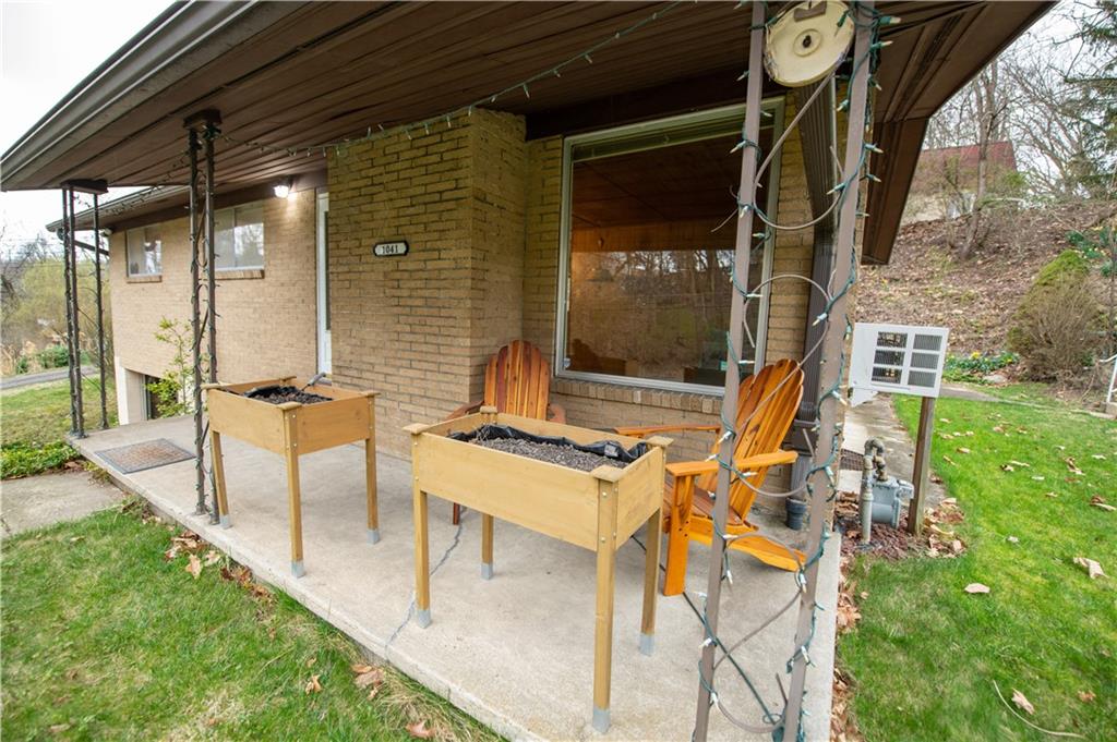 1041 Anderson Road Pittsburgh, PA 15209 - Photo 4 of 41 a patio with table and chairs