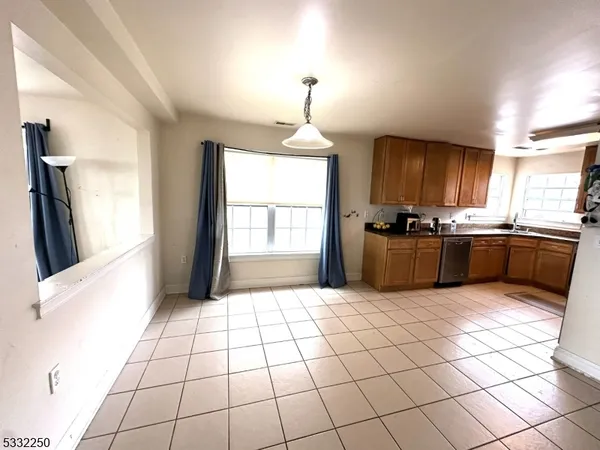 a bedroom with a bed and a table